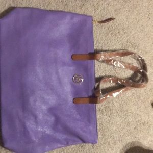 I am selling a purple Joy Mangano purse